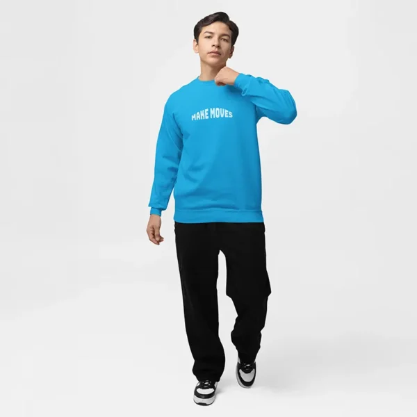 Blue oversized sweatshirt styled with casual pants