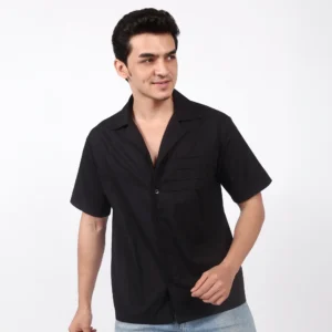 Close-up of the pintuck pleat details on the black shirt.