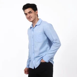 Model wearing the Sky Blue Oxford Button-Down Shirt.